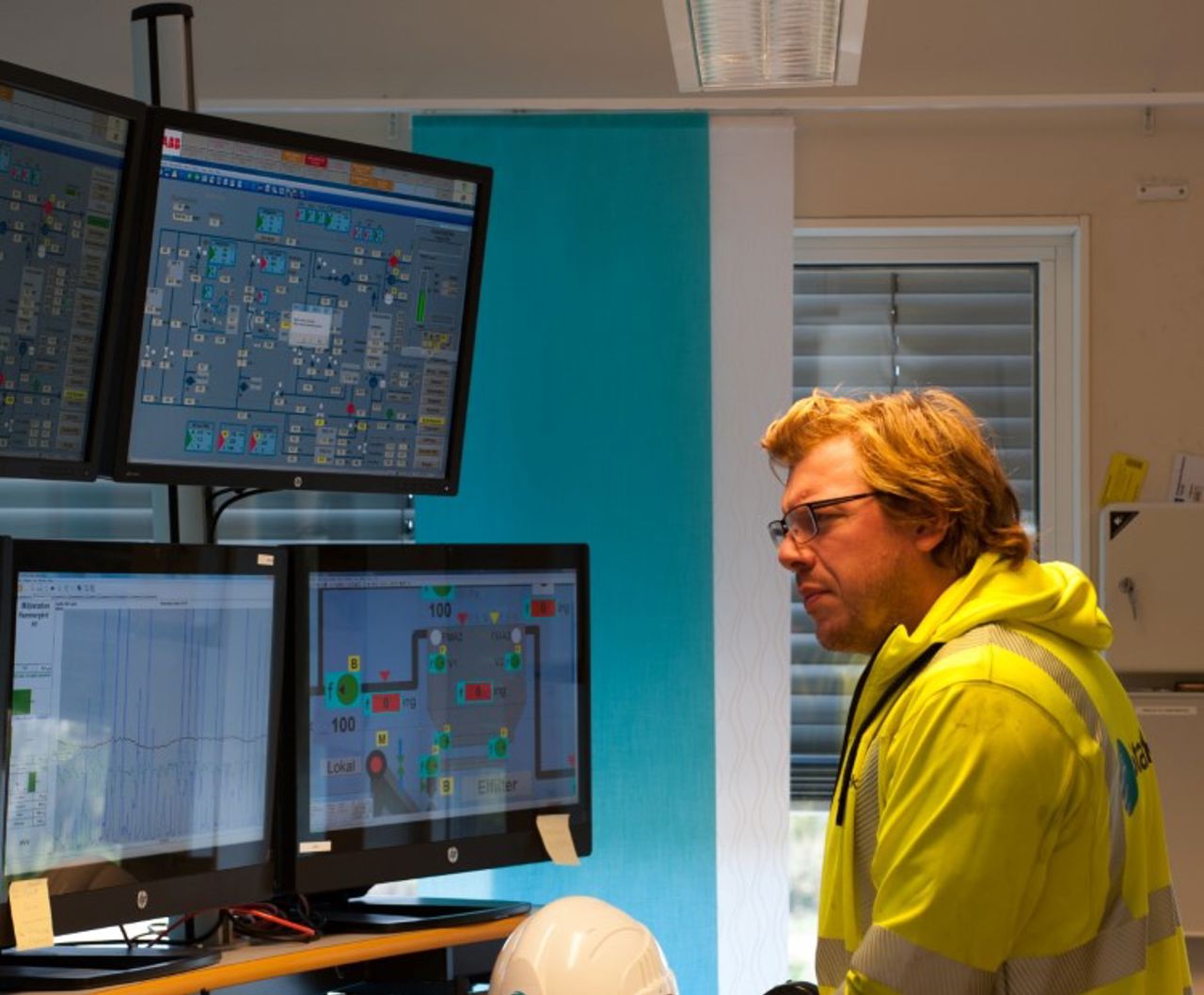 Man standing in control room at Kungsbacka Hammargård in Sweden