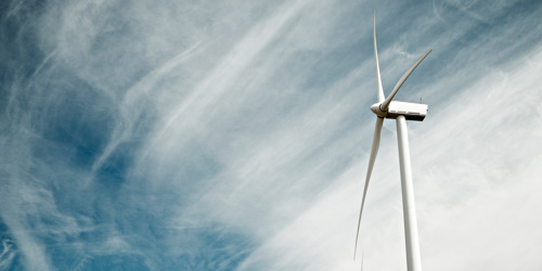 Wind mill and cloudy sky